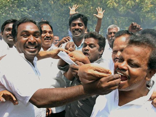 DMK party workers celebrate after party chief M Karunanidhi announced the withdrawal of support from the UPA Government in Chennai. PTI Photo