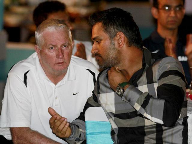 Cricketer MS Dhoni and Indian team coach Duncan Fletcher at the book launch of Yuvraj Singh in New Delhi. Photo by Virendra Singh Gosain/Hindustan Times