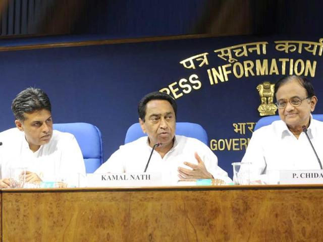 Parliamentary affairs minister Kamal Nath flanked by finance minister P Chidambaram and information broadcasting minister Manish Tiwari addressing a press conference after the GoM in New Delhi. UNI