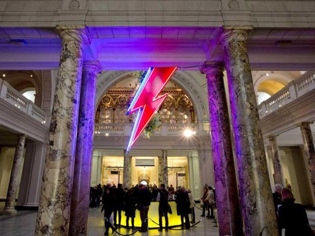 A neon flash representing David Bowie's 'Aladdin Sane' stage character is seen at the entrance to the Victoria and Albert Museum to mark the 'David Bowie is' exhibition in London. (Reuters)