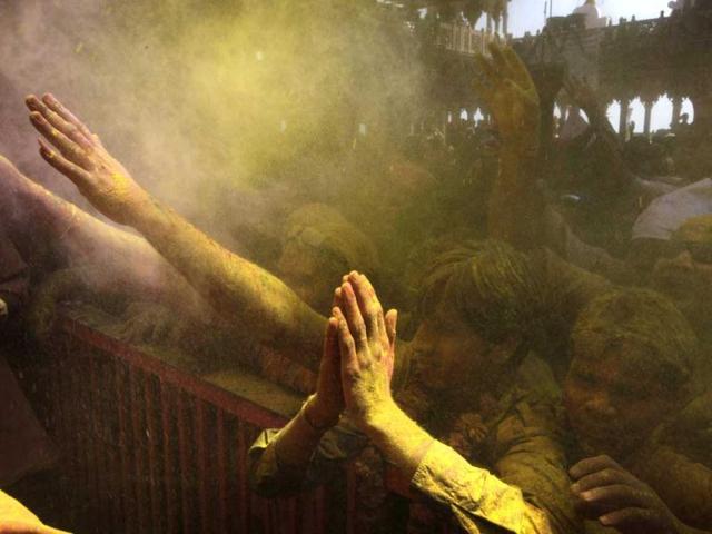Devotees pray at Ladali or Radha temple during the Lathmar Holy festival in Barsana. (AP)