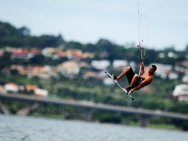 A man practices kitesurf at Paranoa Lake, in Brasilia. (AFP)