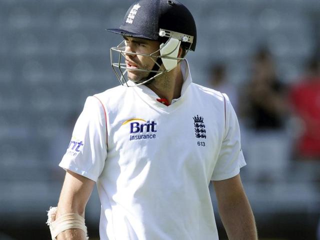 England's James Anderson looks back at the big screen after being dismissed by BJ Watling off the bowling of Trent Boult on the third day of the 3rd international test, at Eden Park, in Auckland, New Zealand. AP Photo