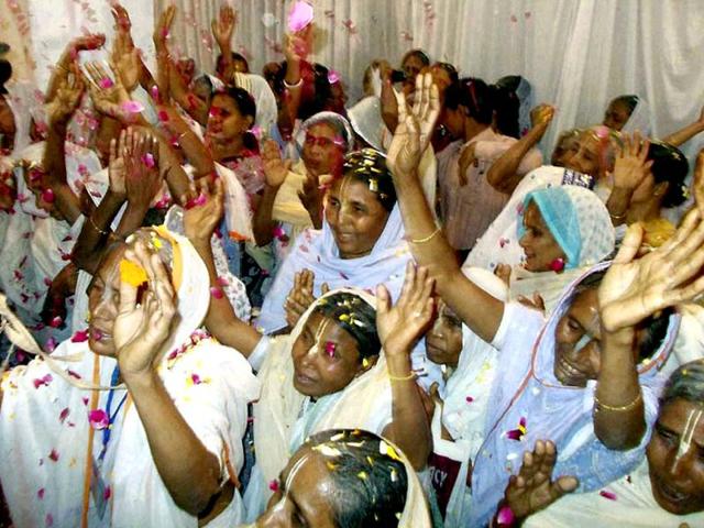 Bengali-widows-celebrating-Holi-festival-with-flower-petals-at-a-ashram-in-Vrindavan-near-Mathura-PTI-Photo
