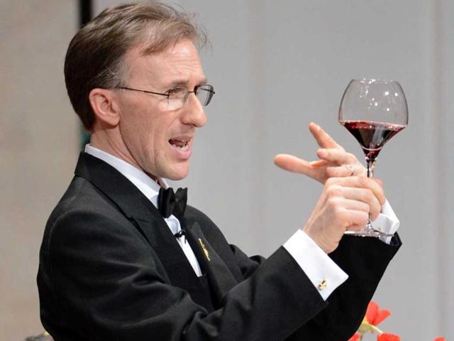 Paolo-Basso-with-a-glass-of-wine