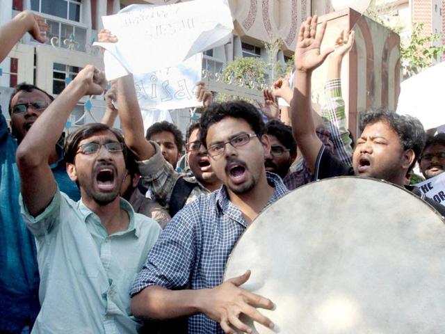 JNU students shout slogans during a protest against West Bengal chief minister Mamata Banerjee over the death of SFI activist Sudipto Gupta, at Banga Bhavan in New Delhi. PTI Photo