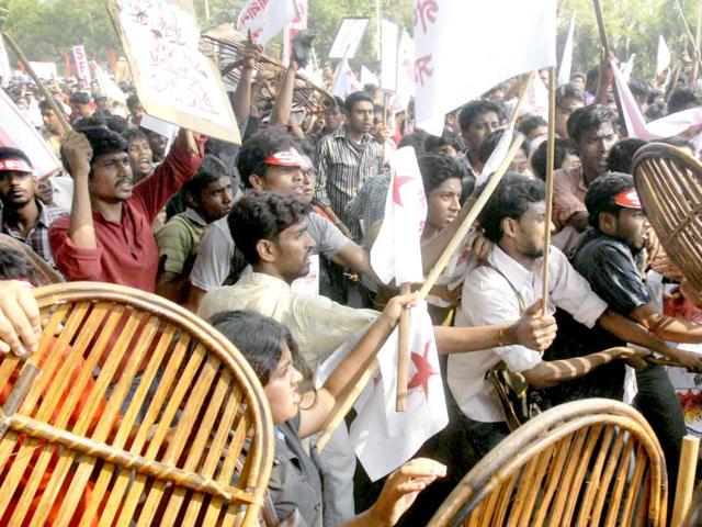 SFI activists clash with the police during their law violation protest against West Bengal government policies, in Kolkata. PTI Photo