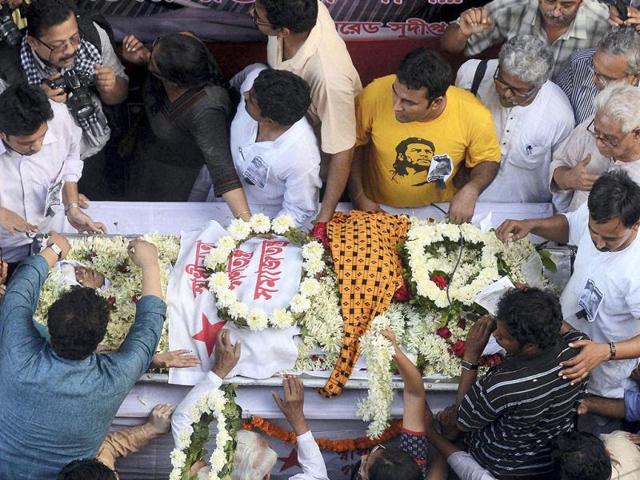 People pay homage during funeral procession of SFI leader Sudipto Gupta, who allegedly died after a clash with Kolkata police in Kolkata. PTI Photo