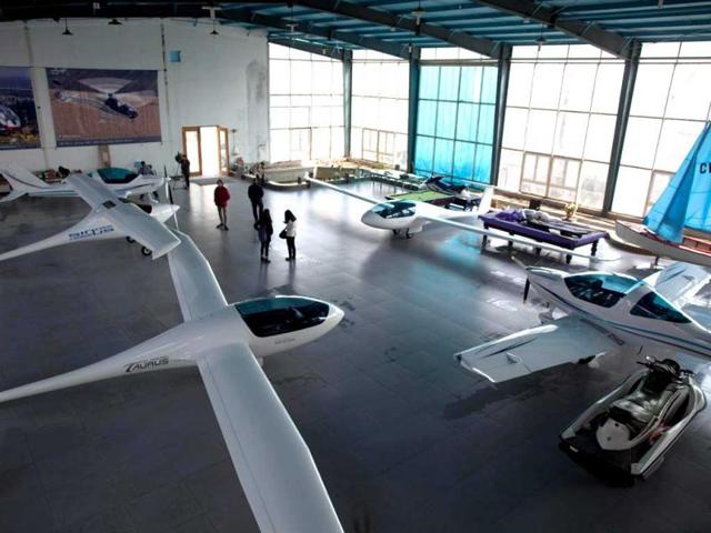 Aircraft are displayed for sale at a showroom on the outskirts of Beijing. Gleaming new helicopters and planes worth millions of dollars are lined up at Beijing's first "aircraft supermarket". AFP photo