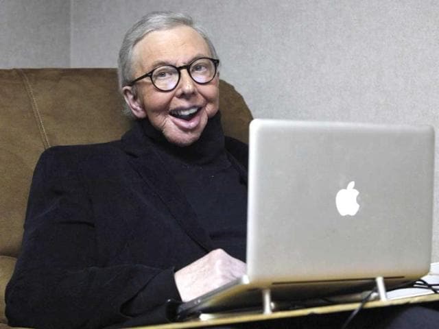 In this Jan 12, 2011 file photo, Pulitzer Prize-winning movie critic Roger Ebert works in his office at the WTTW-TV studios in Chicago. AP/Charles Rex Arbogast/File