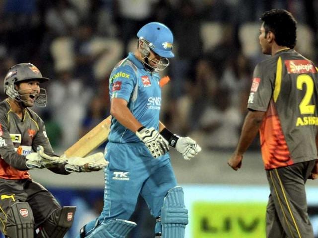 Sunrisers Hyderabad's wicketkeeper Parthiv Patel celebrates as Pune Warriors batsman Ross Taylor walks after his dismissal during the IPL 6 match in Hyderabad. PTI