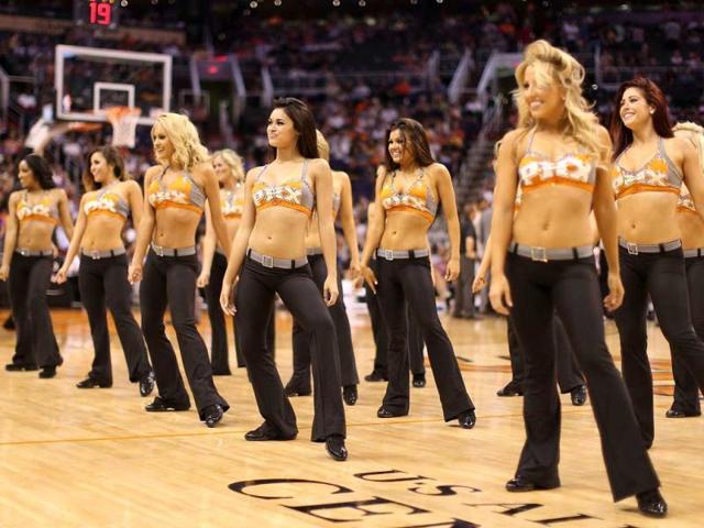 The Phoenix Suns cheerleaders perform during the NBA game against the Golden State Warriors at US Airways Center in Phoenix, Arizona. AFP photo