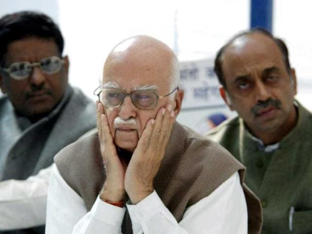 Bharatiya-Janata-Party-leader-Lal-Krishna-Advani-C-gestures-as-party-collegue-Vijay-Goel-R-and-an-unidentified-party-official-look-on-during-a-rally-AFP-photo Bharatiya-Janata-Party-leader-Lal-Krishna-Advani-C-gestures-as-party-collegue-Vijay-Goel-R-and-an-unidentified-party-official-look-on-during-a-rally-AFP-photo