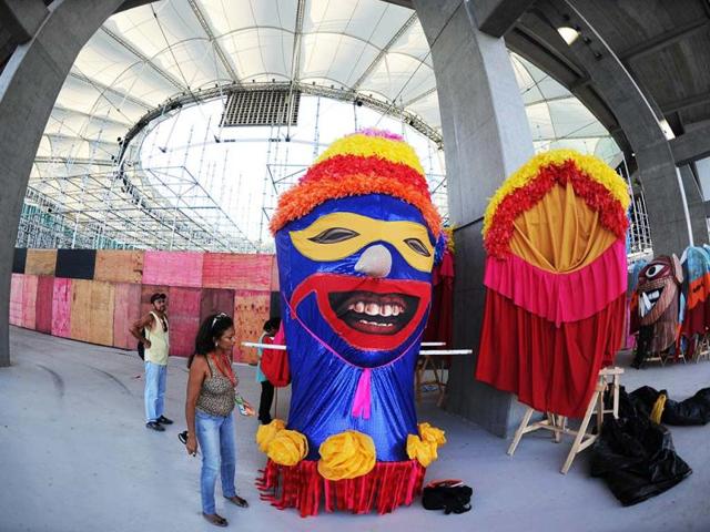 People work for the inauguration ceremony of the "Arena Fonte Nova" stadium, third stadium already finished for the 2013 FIFA Confederations Cup in Salvador de Bahia, Brazil. It will be used in the FIFA World Cup Brazil 2014. AFP