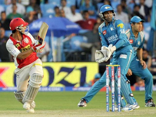 A Kings XI Punjab batsman plays a shot during the Pepsi IPL T20 cricket match 2013 against Pune Warriors India at the Subrata Roy Sahara Stadium in Pune. HT Photo/Vijayanand Gupta