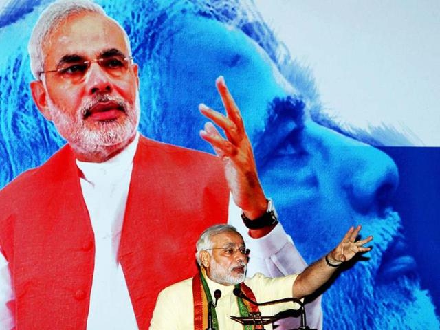 Narendra Modi speaks during a special session on 'Vibrant Growth Model' in Kolkata on Tuesday. (PTI)