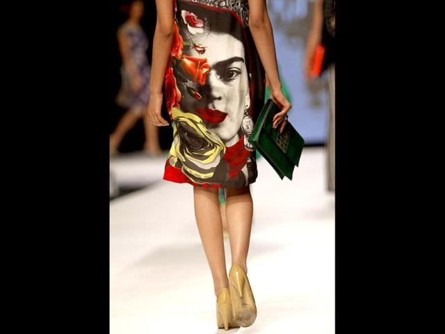 A Pakistani model presents a creation by designer Ayesha Ibrahim at the show. (AP Photo)