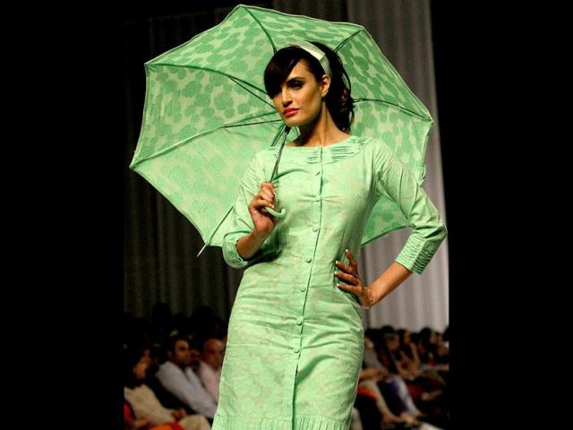 A Pakistani model presents a creation by Kayseria, on the second and last day of Fashion Pakistan Week, in Karachi, Pakistan. The fifth edition of Fashion Pakistan Week was concluded on Wednesday. (AP Photo)