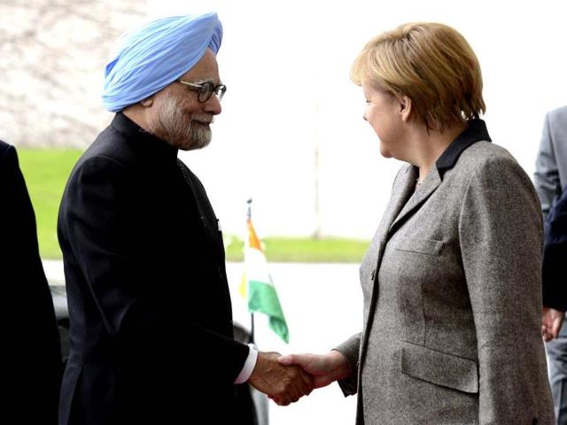 Prime Minister Manmohan Singh is welcomed by German Chancellor Angela Merkel as he arrives at the Chancellery in Berlin. Singh and key cabinet ministers meet for their second Indo-German intergovernmental consultations in Berlin. AFP photo