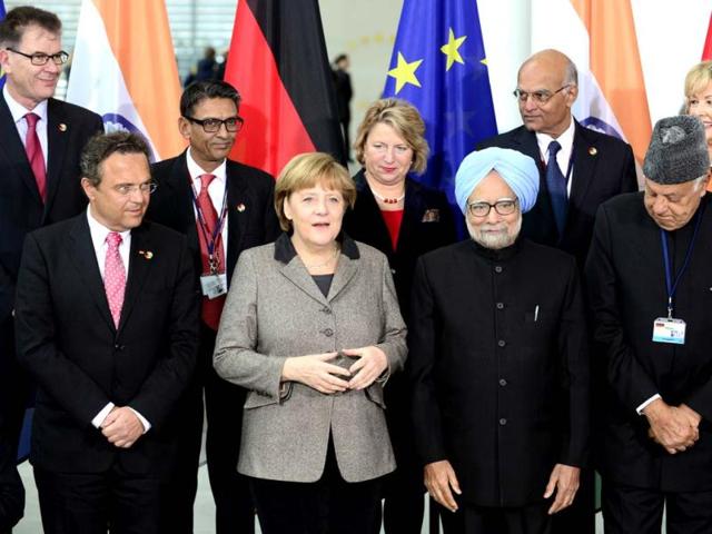 Prime Minister Manmohan Singh and German Chancellor Angela Merkel pose with cabinet and delegation members at the Chancellery in Berlin. AFP photo