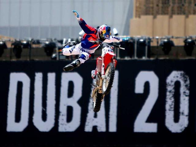 A motocross rider shows his skills during a training session on the eve of the 2013 Red Bull X-Fighters World Tour in the Gulf emirate of Dubai. AFP