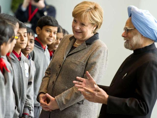 Prime Minister Manmohan Singh and German Chancellor Angela Merkel talk with pupils of an Indian school class at the Chancellery in Berlin. AFP photo