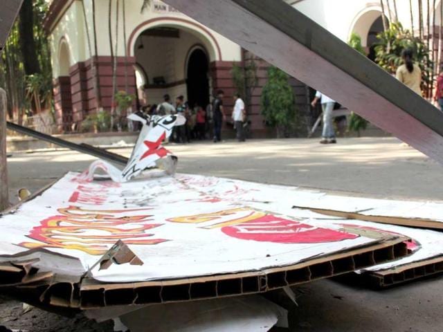 Torn signboards form part of the debris left behind after TMC activists ransacked the classrooms and laboratories of the Presidency University campus in Kolkata. HT Photo`