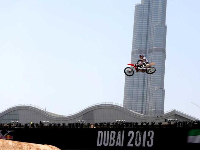 A motocross rider shows his skills during a training session on the eve of the 2013 Red Bull X-Fighters World Tour in the Gulf emirate of Dubai. AFP