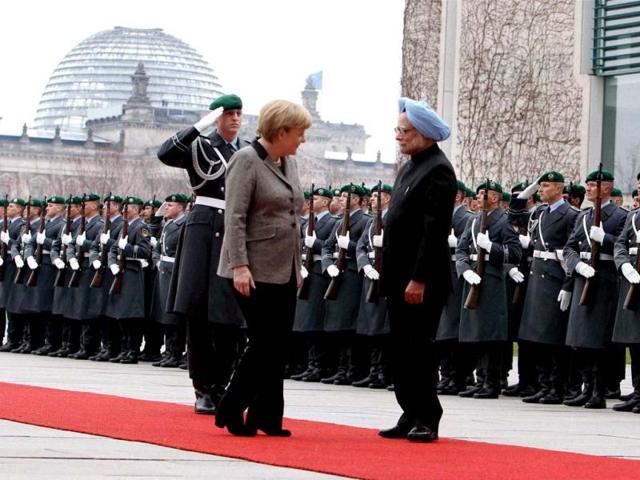 Prime Minister Manmohan Singh with German Chancellor Angela Merkel receive Military honour during an official welcoming ceremony at the Federal Chancellery in Berlin. PTI photo