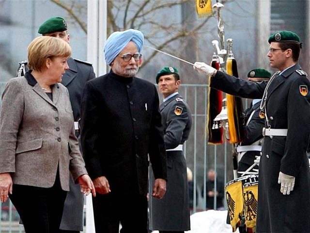 Prime Minister Manmohan Singh with German Chancellor Angela Merkel receive Military honour during an official welcoming ceremony at the Federal Chancellery in Berlin. PTI photo