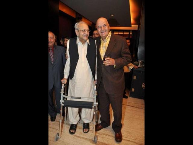 Two villains Pran and Prem Chopra together at a party in Mumbai. (HT Photo)