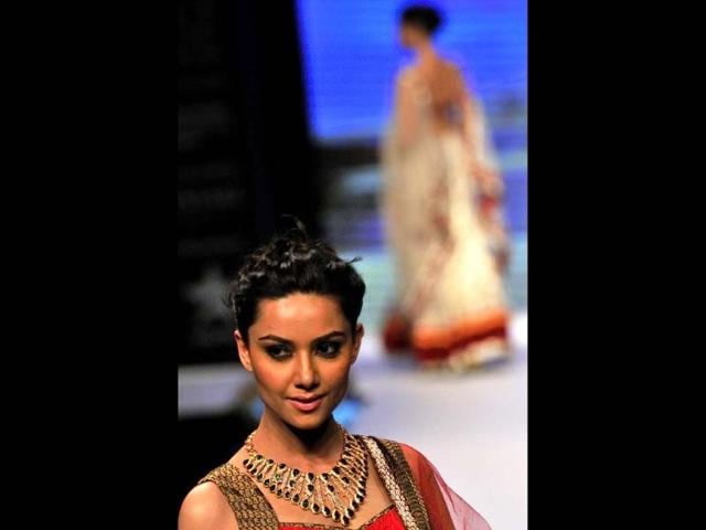 A model displays jewellery at the Gem and Jewellery Fair at Pragati Maidan in New Delhi. HT Photo/Vipin Kumar