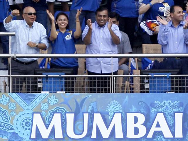 Mumbai Indians owner, Mukesh Ambani cheers for his team during T20 match between Mumbai and Pune Warriors India at Wankhede Stadium in Mumbai. HT Photo