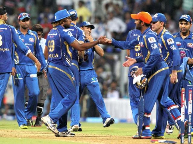 Mumbai Indians celebrate their win over Pune Warriors during an T20 match in Mumbai. PTI Photo