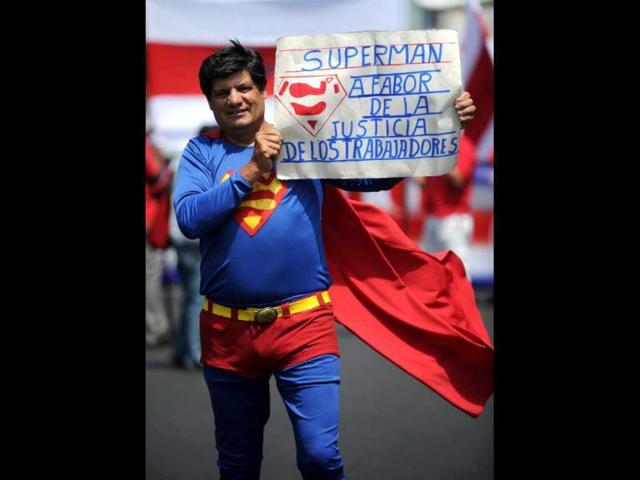 A worker dressed as Superman joins members of various labour unions during in a rally on Labour Day in San Jose, Costa Rica. AFP photo