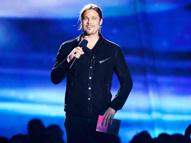 Actor Brad Pitt presents the award for movie of the year at the 2013 MTV Movie Awards in Culver City, California April 14, 2013. (Reuters)