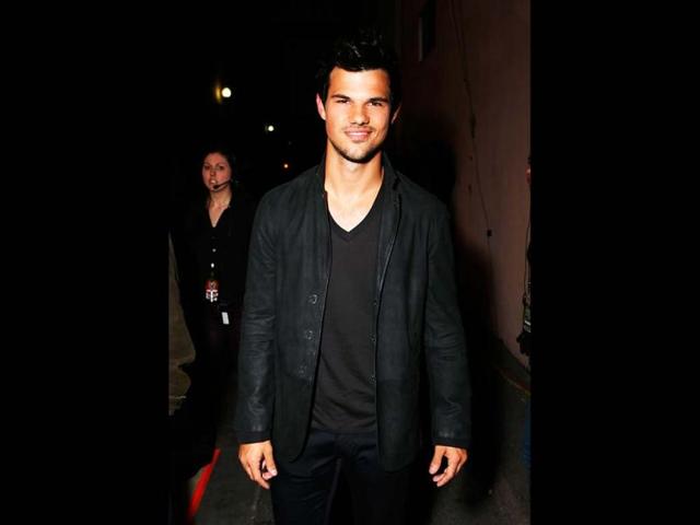 Actor Taylor Lautner poses backstage at the MTV Movie Awards in Sony Pictures Studio Lot in Culver City, California (MTV/AP Images)