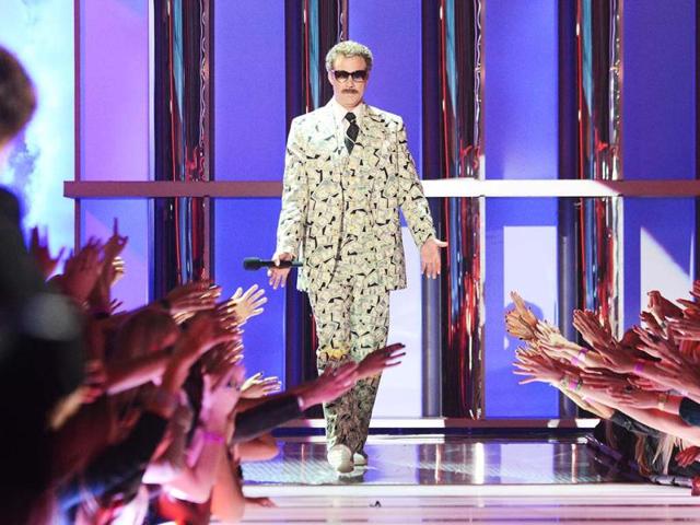 Million dollar man! Will Ferrell in a money suit at the 2013 MTV Movie Awards. (AP Images)