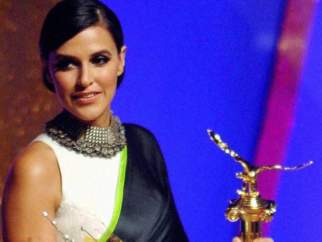 Actress Neha Dhupia is felicitated during Baisakhi celebration in Mumbai. (PTI Photo)