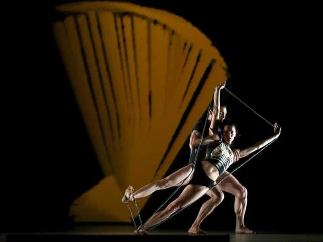 Dancers from the "Octopus," directed by award-winning choreographer Philippe Decoufle, perform during a technical rehearsal at the Esplanade theater in Singapore on Friday April 19, 2013. The French production is in the city-state as part of the Esplanade's "da:ns" series featuring international dance companies as part of its annual event. (AP Photo/Wong Maye-E)