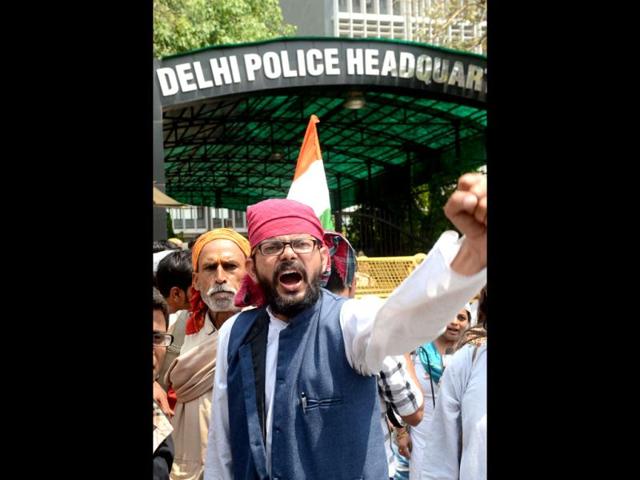 Protestors shout anti-government and Delhi police slogans during a demonstration against the rape of a five-year old girl in front of police headquaters in New Delhi. AFP