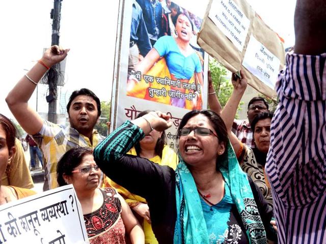 Women hit the New Delhi streets in protest after the brutal rape and torture of a five year old girl over 40 hours. AFP
