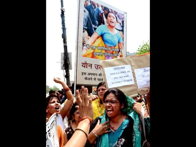Protestors shout anti-government and Delhi police slogans during a demonstration against the rape of a five-year old girl in front of police headquaters in New Delhi. AFP