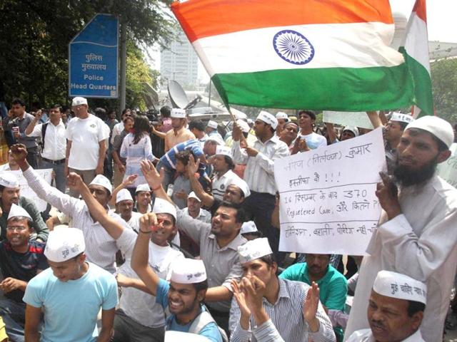 People protesting against the Delhi Police over the recent rape of a minor girl at Police Headqaurters in New Delhi on Saturday. PTI