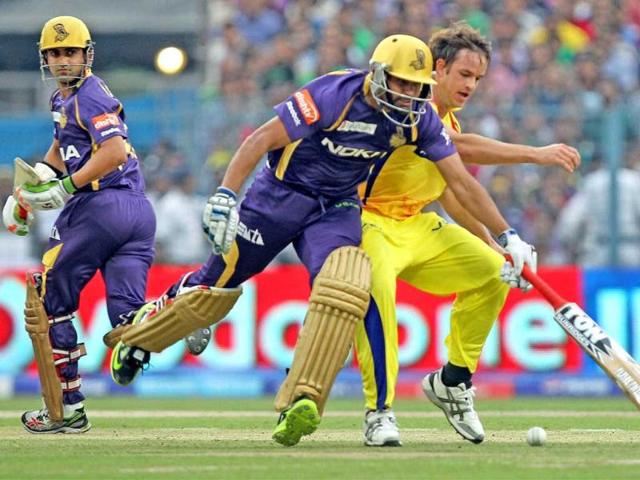 KKR's Yusuf Pathan tries hard to complete a run as Gautam Gambhir looks on during T20 match against Chennai Super Kings in Kolkata. PTI