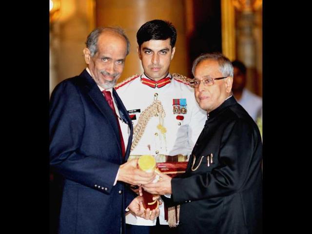 President Pranab Mukherjee presents Padma Vibhushan to Roddam Narasimha for his contribution in the field of aero-space technology at Padma Awards 2013 at the Rashtrapati Bhavan in New Delhi. PTI