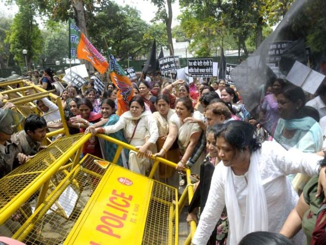 BJP Mahila Morcha activists participating at a demonstration outside the residence of Congress President Sonia Gandhi in protest against the rape of a 5 year old girl in New Delhi. UNI photo