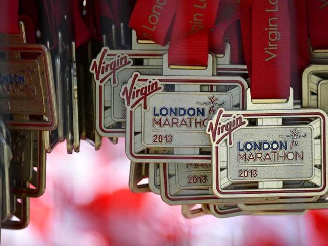 Finishers' medals are seen hanging after the finish line of the London Marathon. Undaunted by the Boston Marathon bombings, big crowds lined the route of London's mass road race on Sunday to cheer on around 36,000 runners, many of whom wore black ribbons to remember the dead and wounded. Reuters