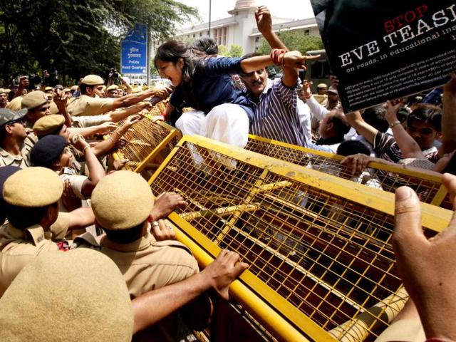 Protestors-bring-down-barricades-during-a-protest-outside-Delhi-Police-Headquarter-in-New-Delhi-Raj-K-Raj-HT