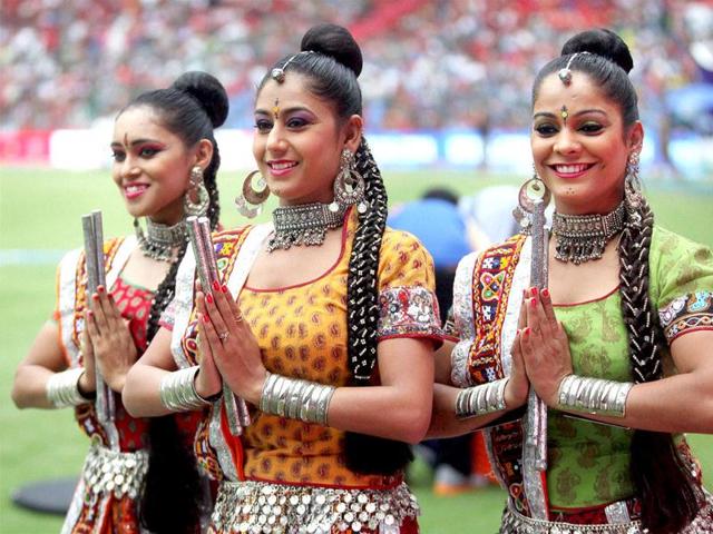 Pune Warriors cheer girls perform during the T20 match with Royal Challengers Bangalore at Chinnaswamy Stadium in Bangalore. (PTI)
